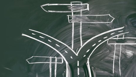 Bildet av en tavle med krittegning av veivalg Bildet av en tavle med krittegning av veivalg