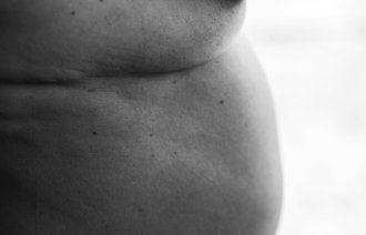 Utsnitt av kropp Utsnitt av en naken kropp