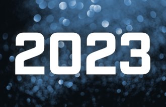 Bildet viser blått glitter og årstallet 2023