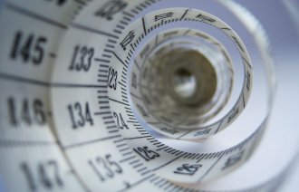 Bildet viser et målebånd.