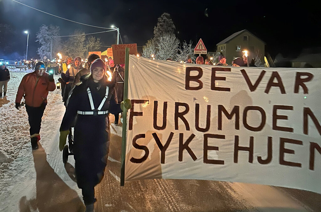 Mette Schaer i fakkeltog bildet viser Mette Schaer i fakkeltog