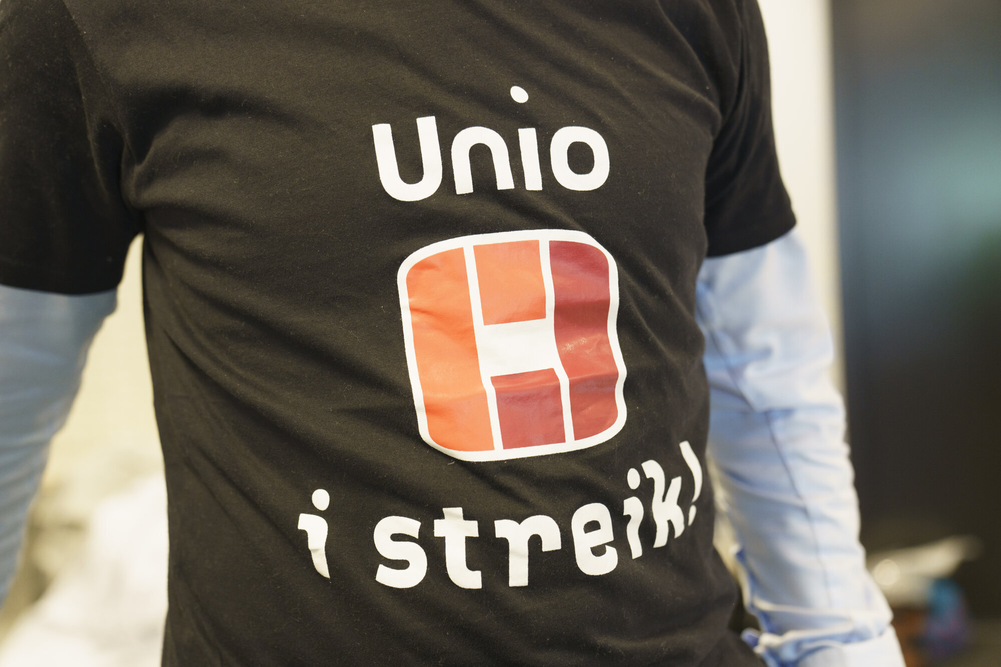 Unio, streik Bildet viser utsnittet av en t-shorte der det står "Unio i streik".