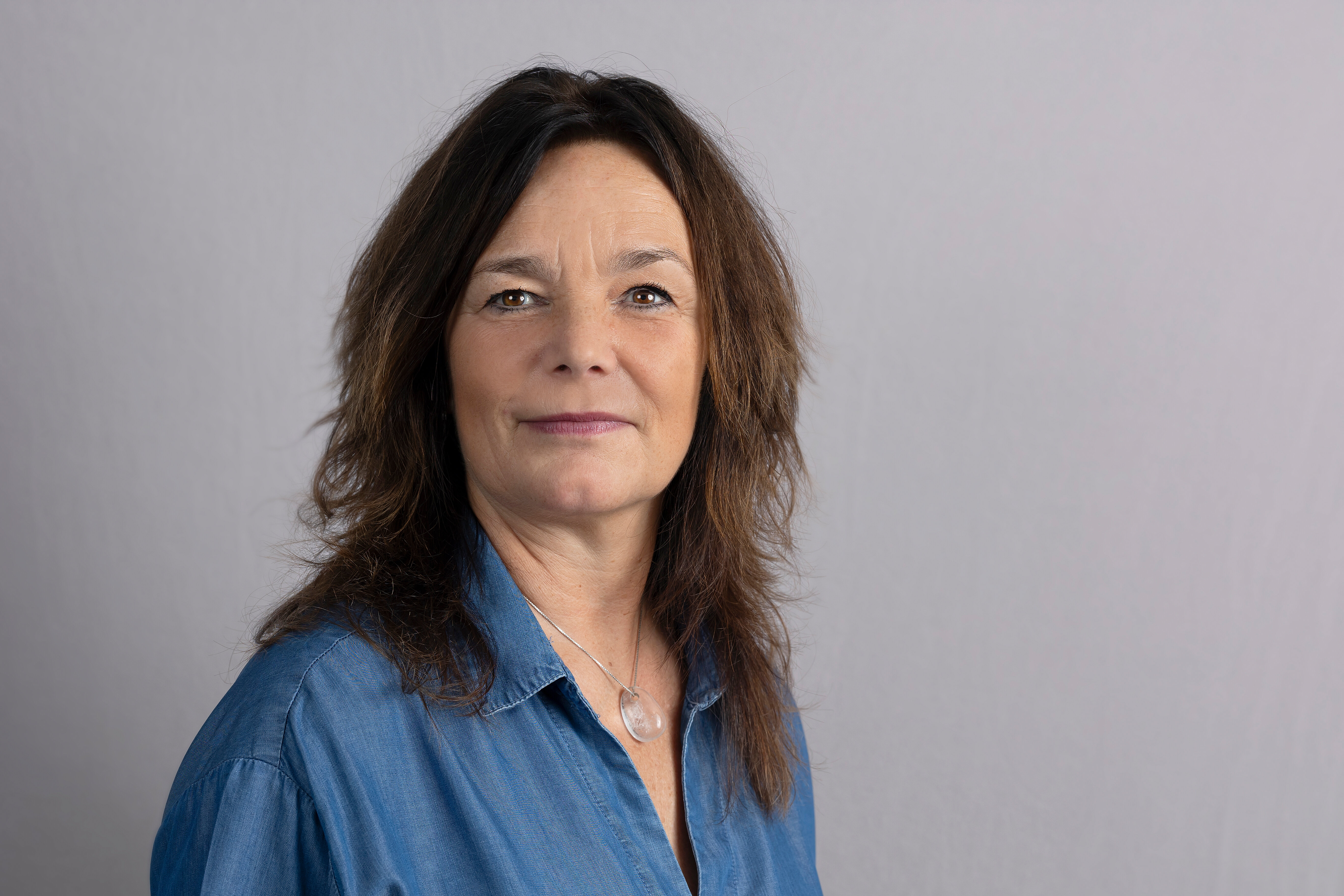 Bildet viser et portrettbilde av Marianne Smeby Strand