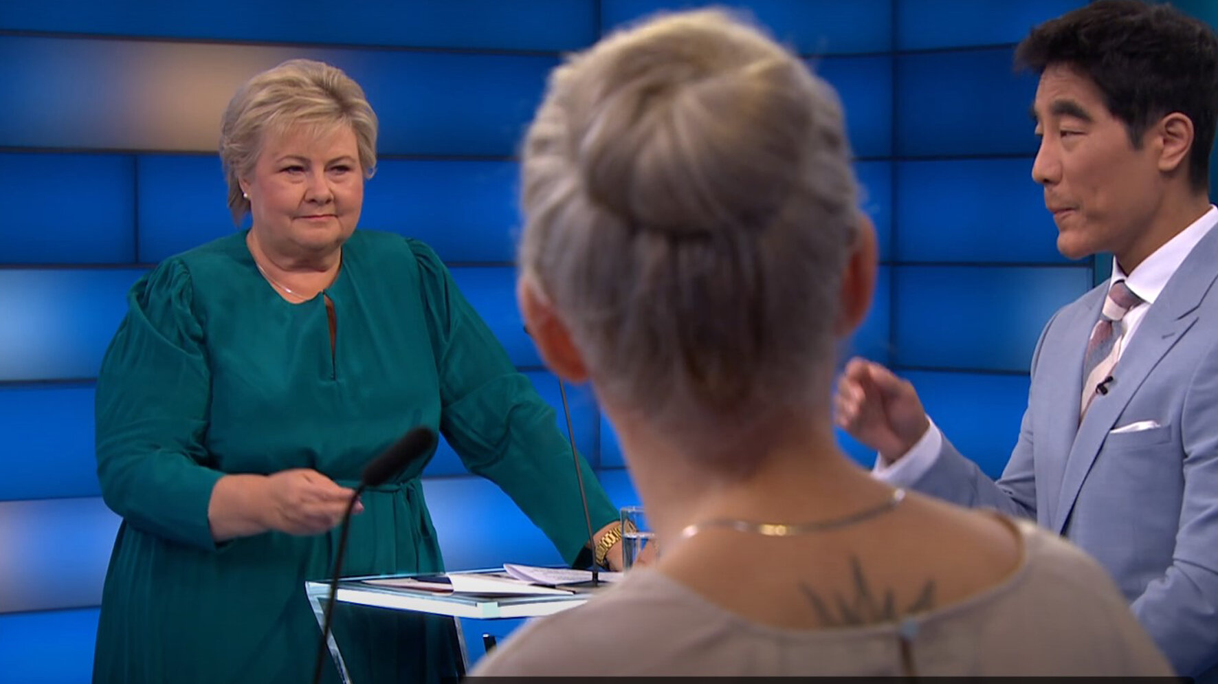 Bilde av Erna Solberg og Fredrik Solvang fra partilederdebatt august 2025