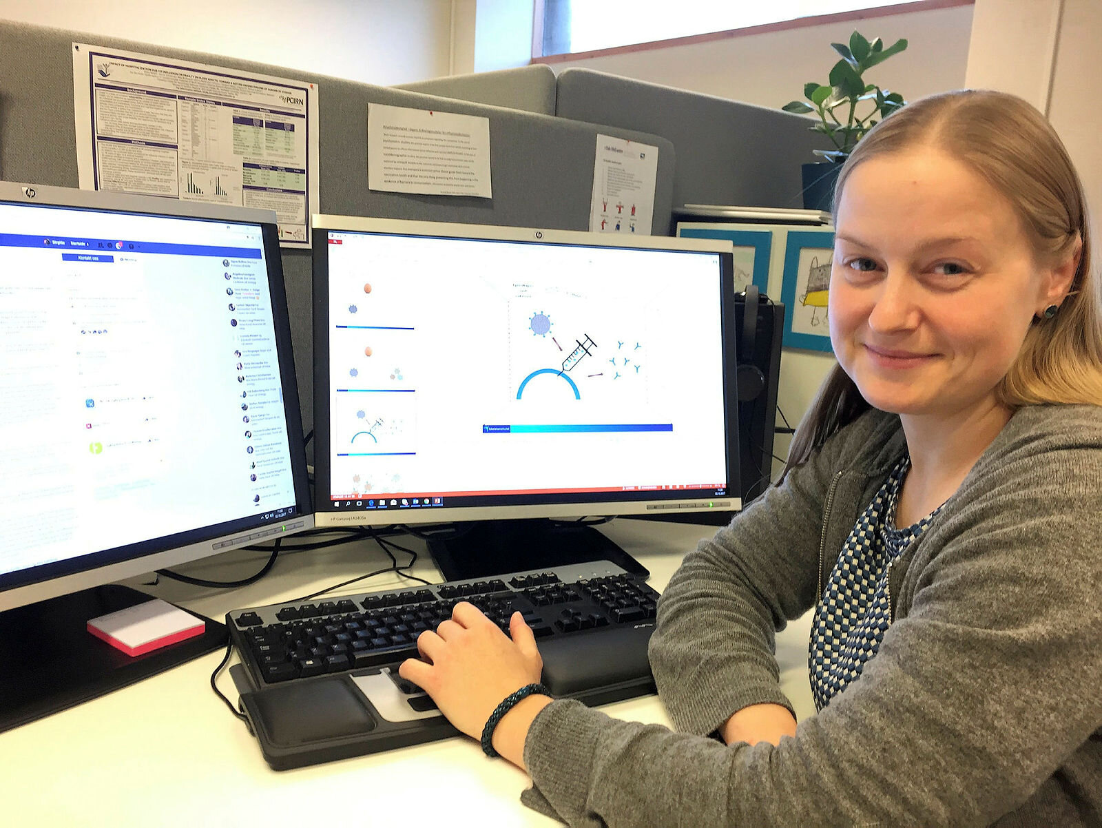 - Det er ikke mulig å få influensa av influensavaksinen Bildet viser Birgitte Klüwer som sitter foran en datamaskin der skjermbildet viser illustrasjoner på influensavaksine.