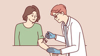 Influensavaksinering Illustrasjonen viser en dame som får vaksine av en lege