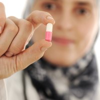 Innvandrerkvinne med pille